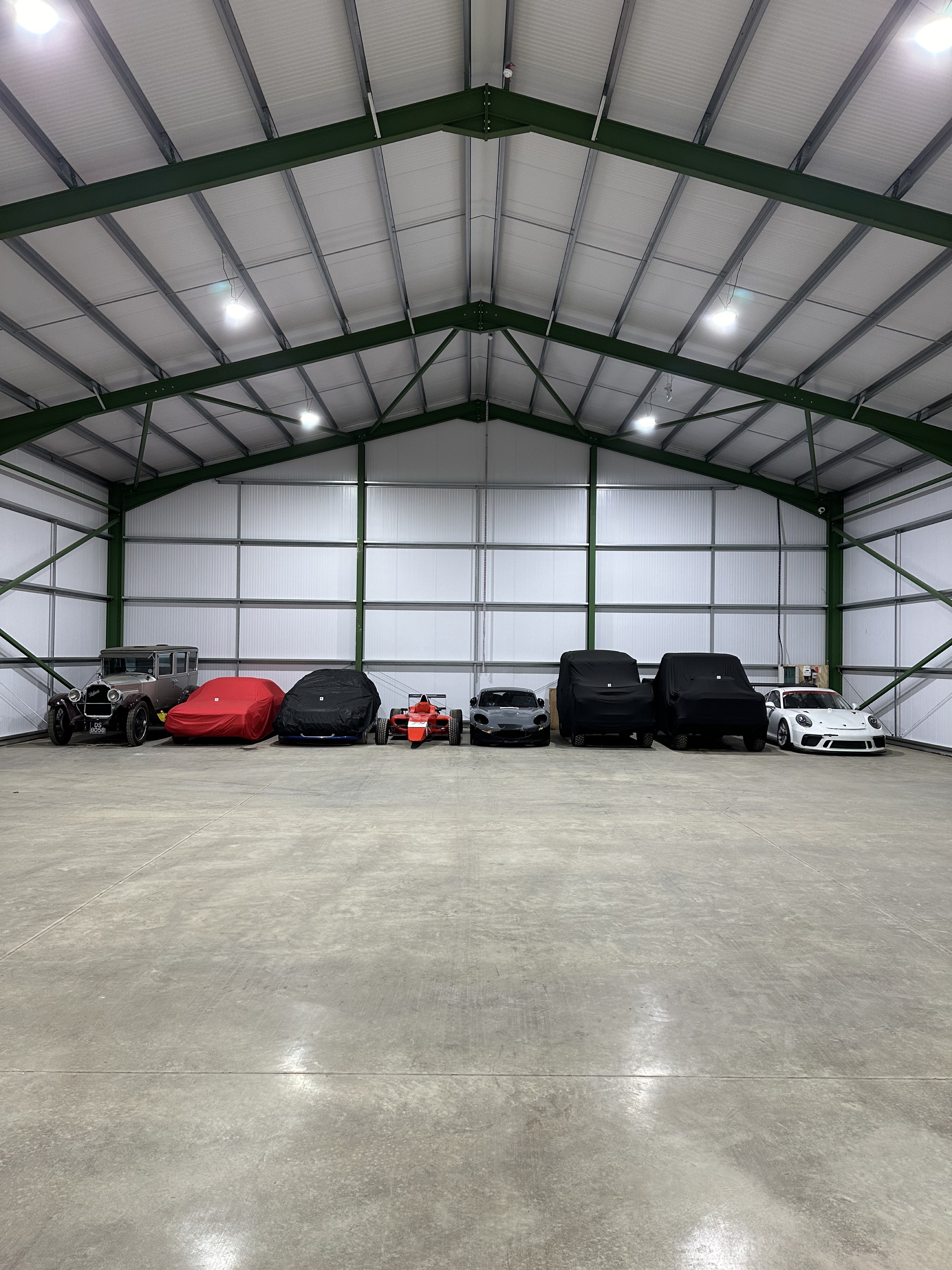 Classic cars outside the storage facility